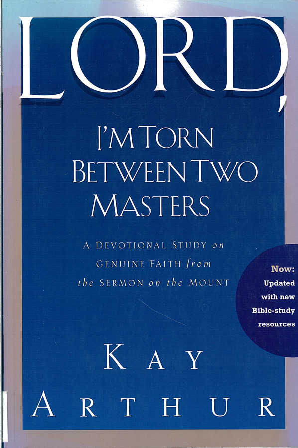Picture of the front cover of the book entitled Lord I'm Torn Between Two Masters.